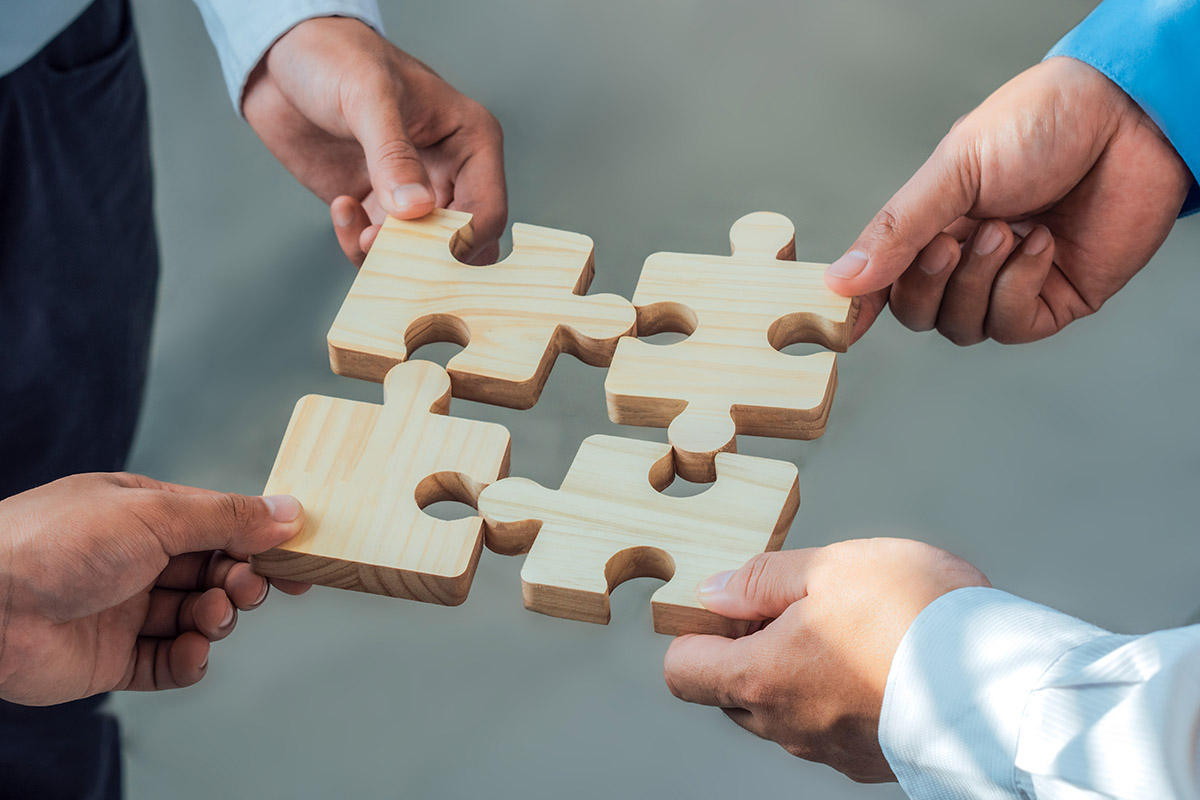 authentic telemarketing people putting puzzle pieces together
