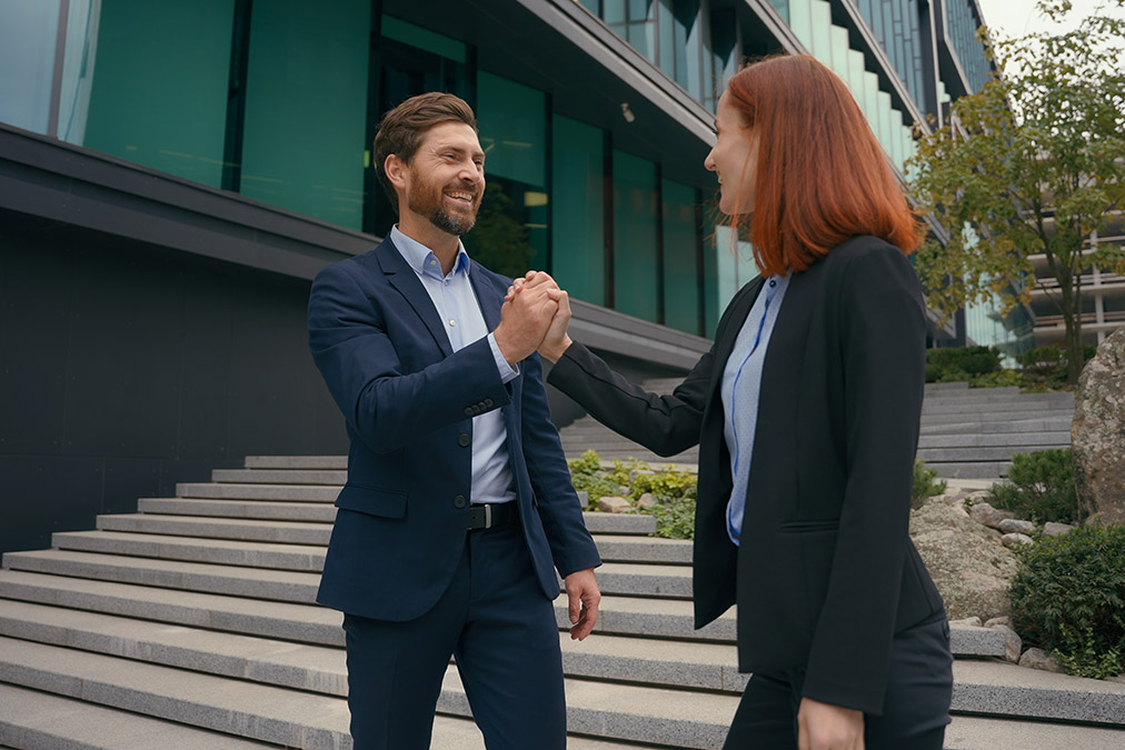 authentic telemarketing people shaking hands